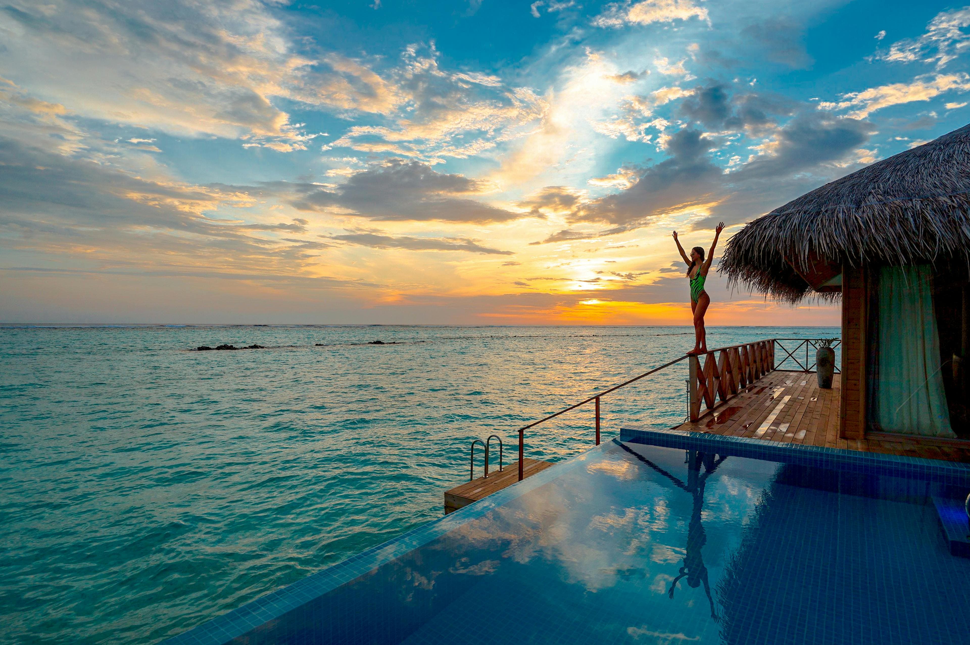 Traveler enjoying sunset